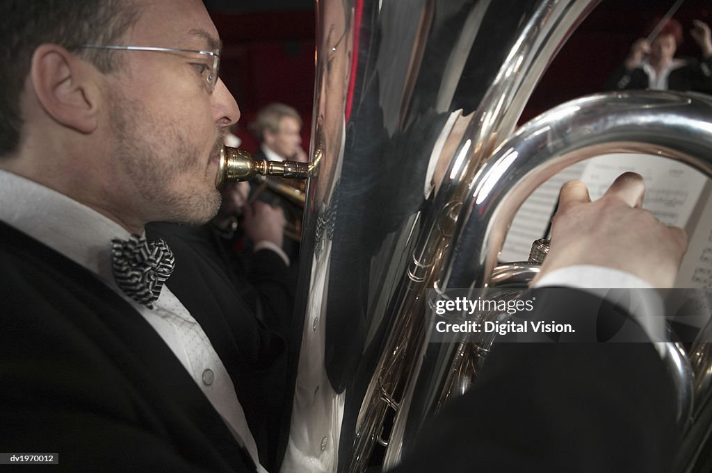 Man Playing a Tuba