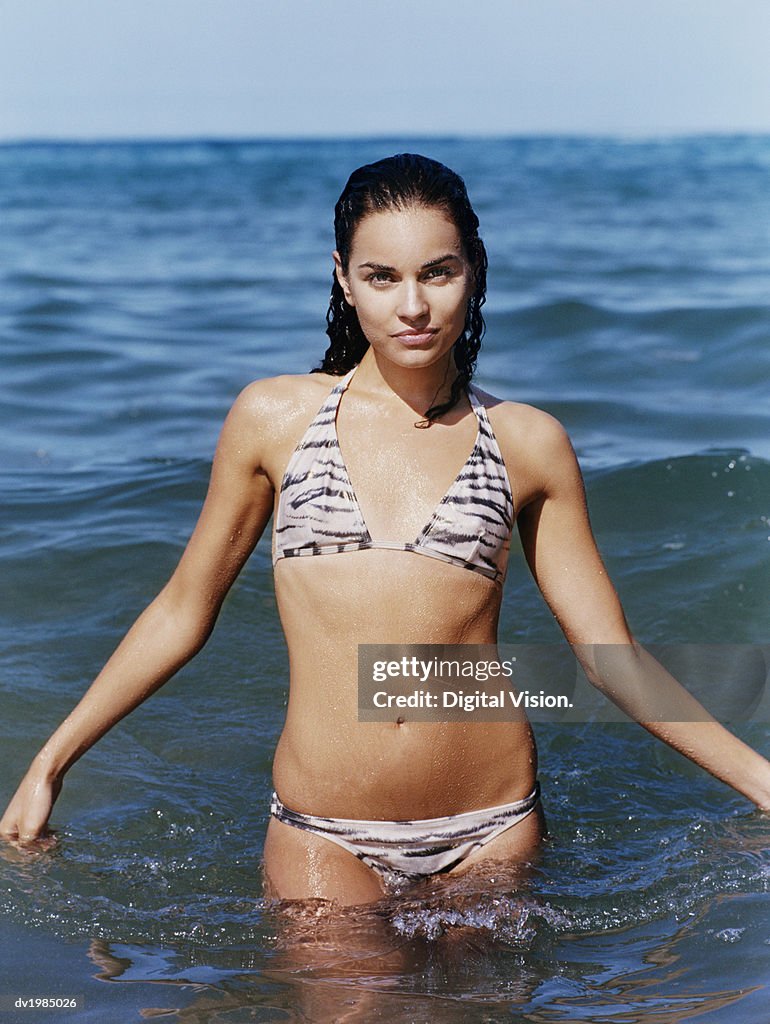 Portrait of a Young Woman Standing in the Sea