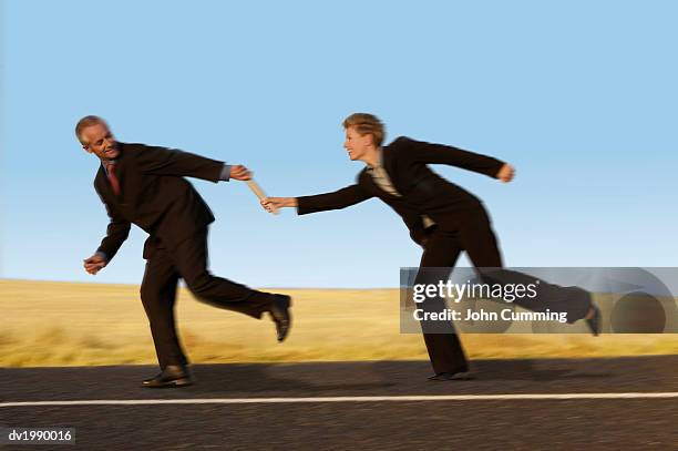 Middle Man Hand Off 146 Business Handoff Stock Photos, High-Res Pictures, and Images ...