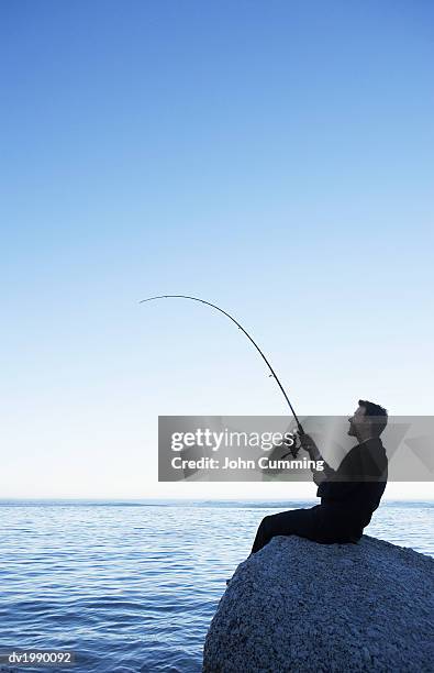 170 Bent Fishing Rod Stock Photos, High-Res Pictures, and Images
