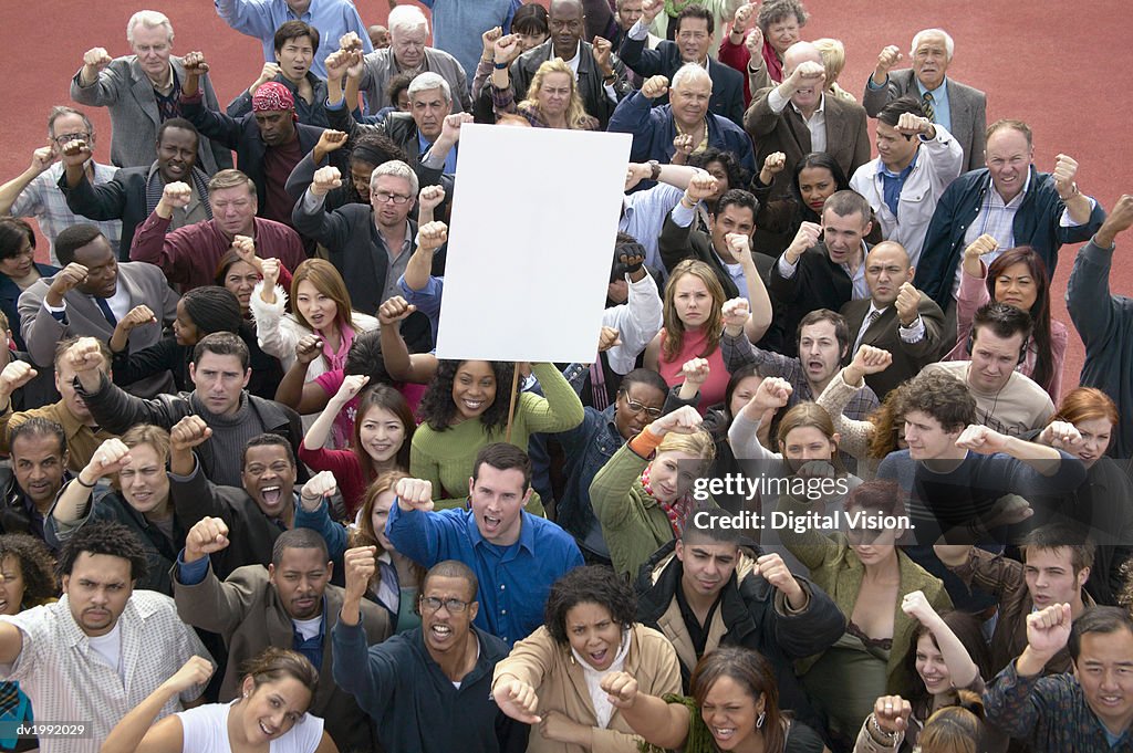 Crowd Protesting, Woman Holding a Blank Placard