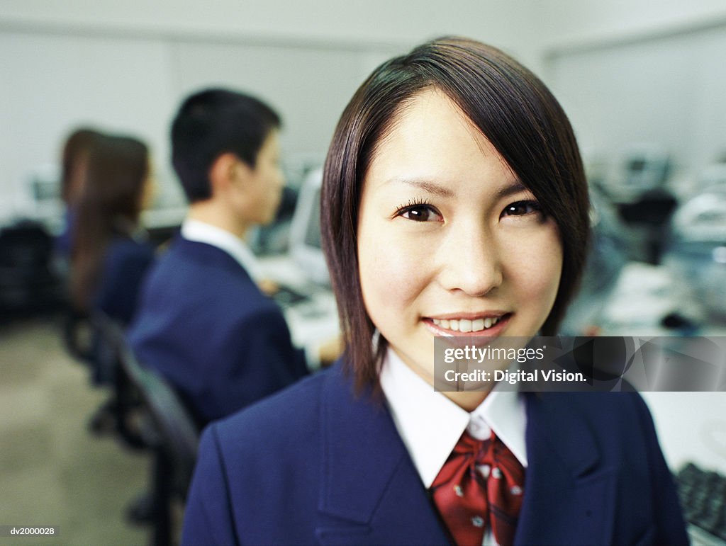 Female High School Student in a Computer Classroom