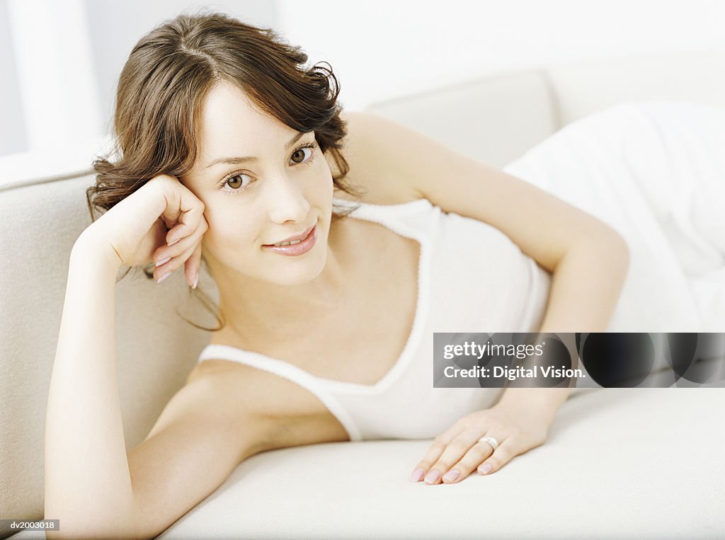 Woman Lying on a Sofa