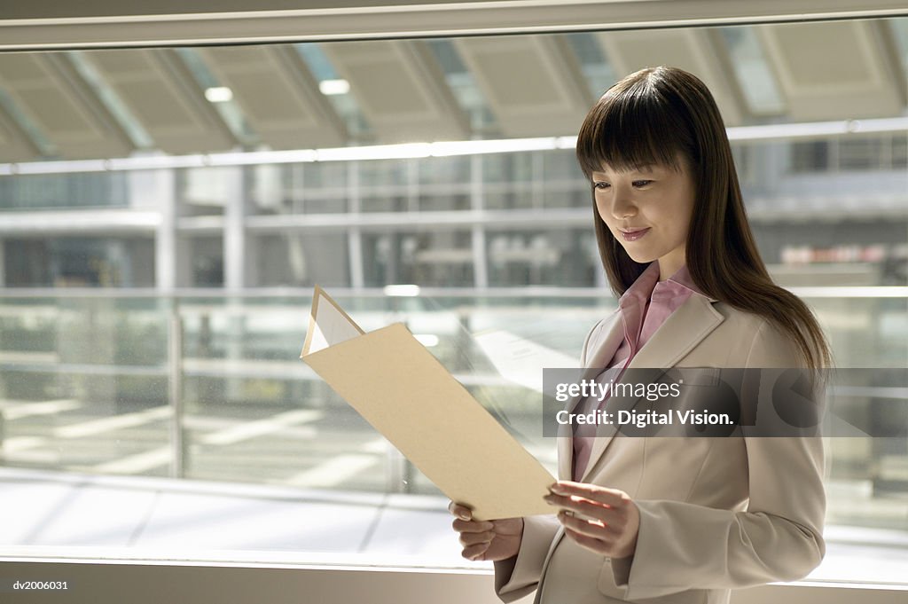 Businesswoman Reading a Document