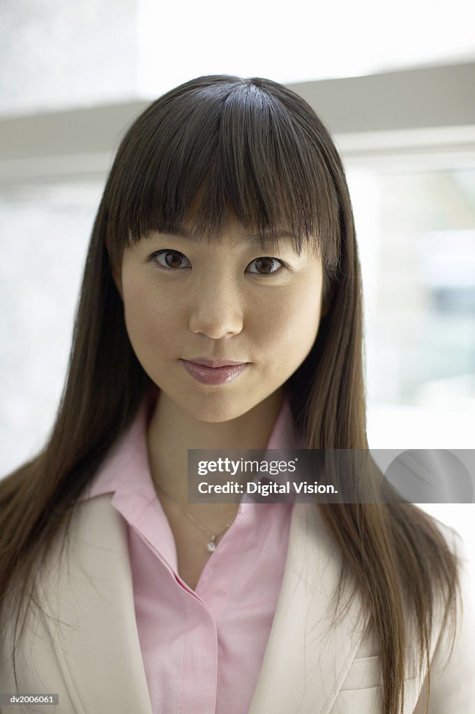 Portrait of a Businesswoman With Long, Black Hair