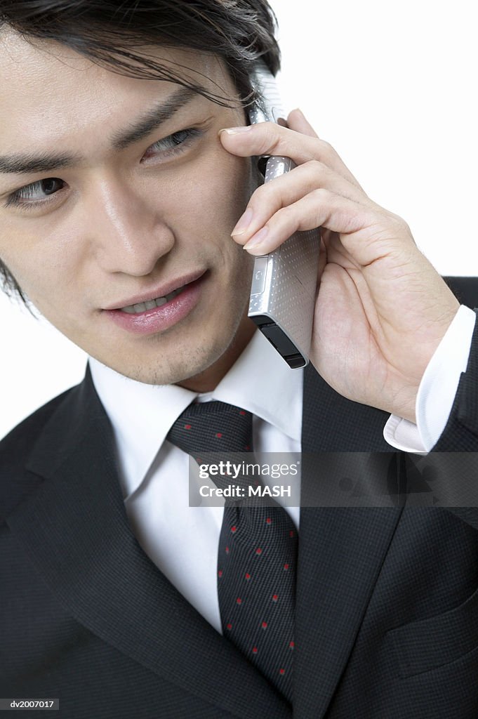 Businessman Using a Mobile Phone