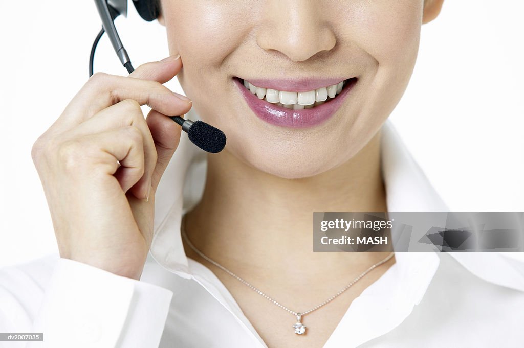 Close Up of a Businesswoman Wearing a Headset