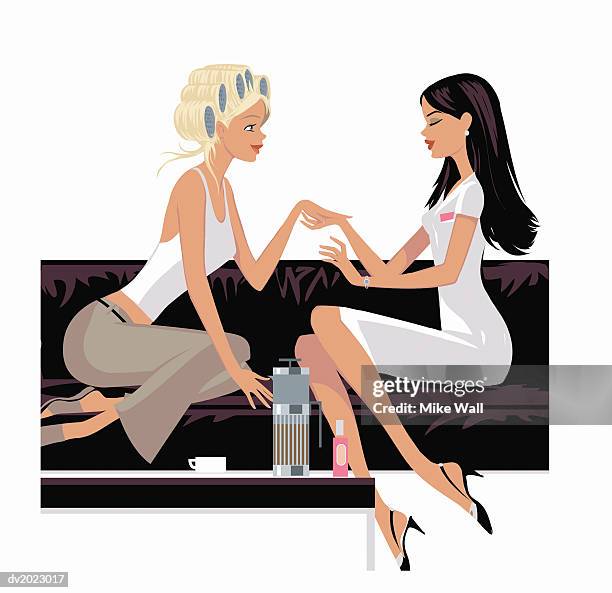 beautician sits on sofa giving a woman a manicure - mike 幅插畫檔、美工圖案、卡通及圖標