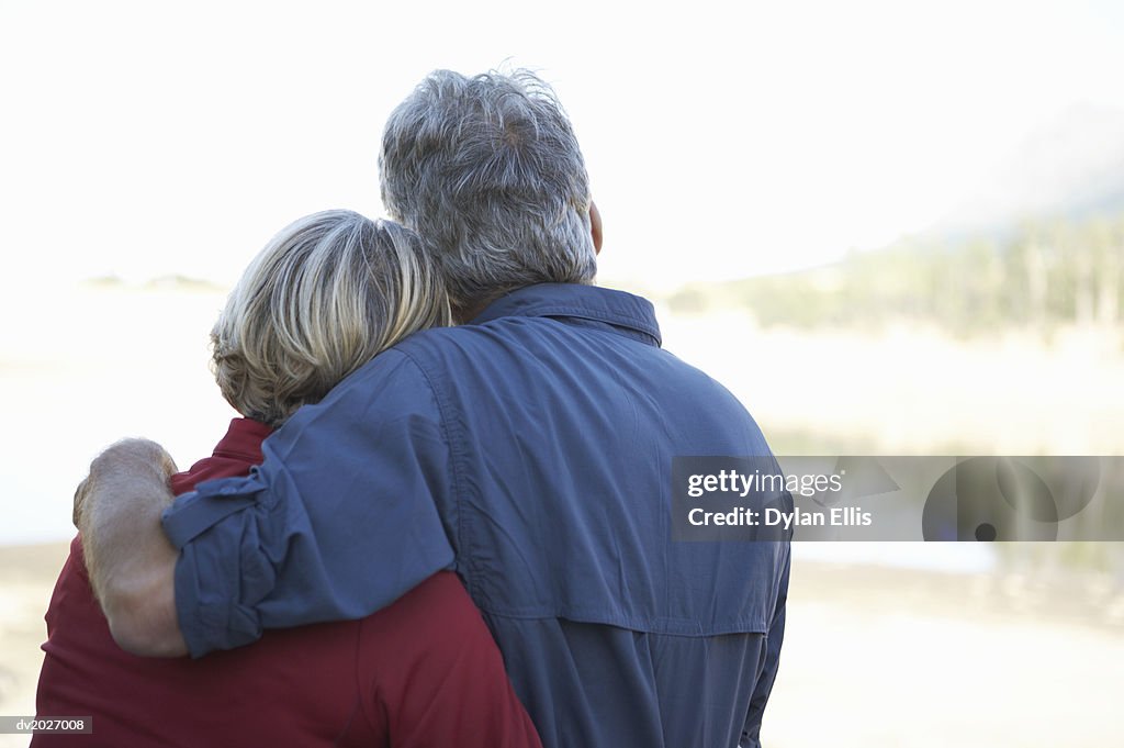 Rear View of Mature Couple Embracing