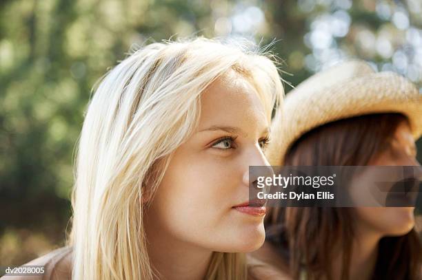 two women looking ahead - ahead stock pictures, royalty-free photos & images