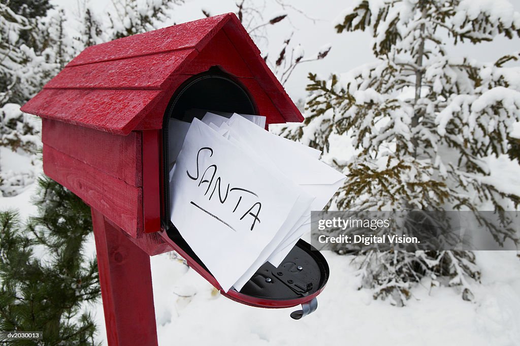 Red Post Box Containing Letters to Santa