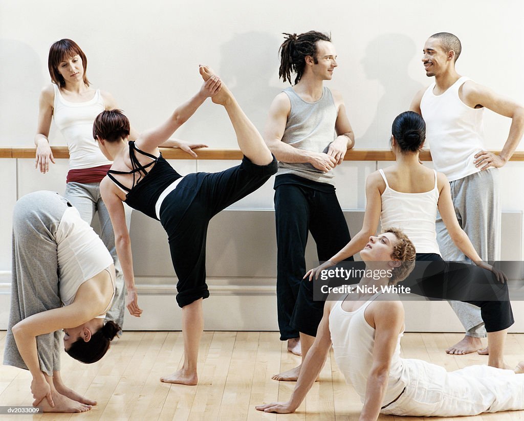 Group of Dancers Doing Stretching Exercises