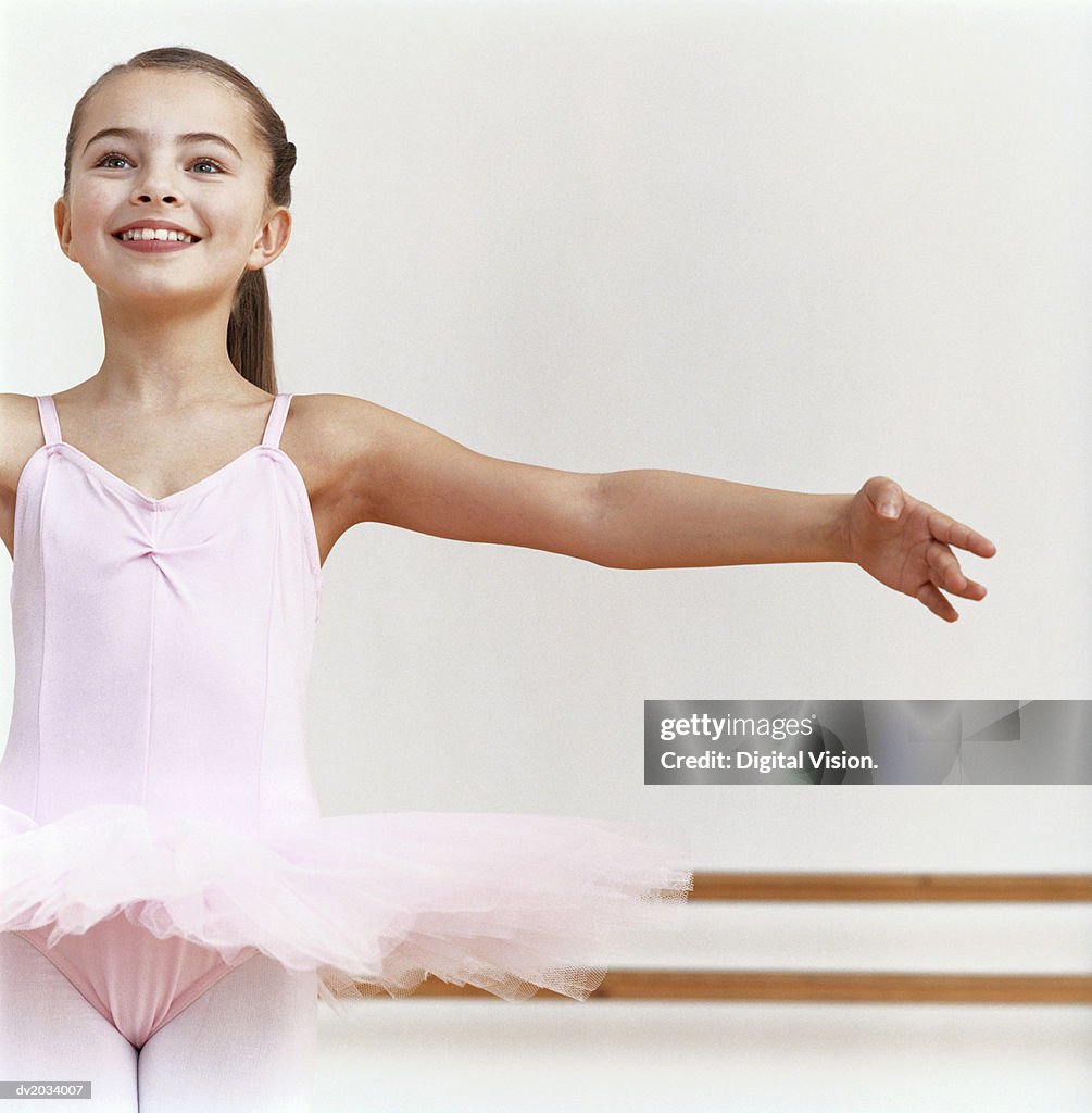 Young Ballet Dancer Practicing in a Dance Studio