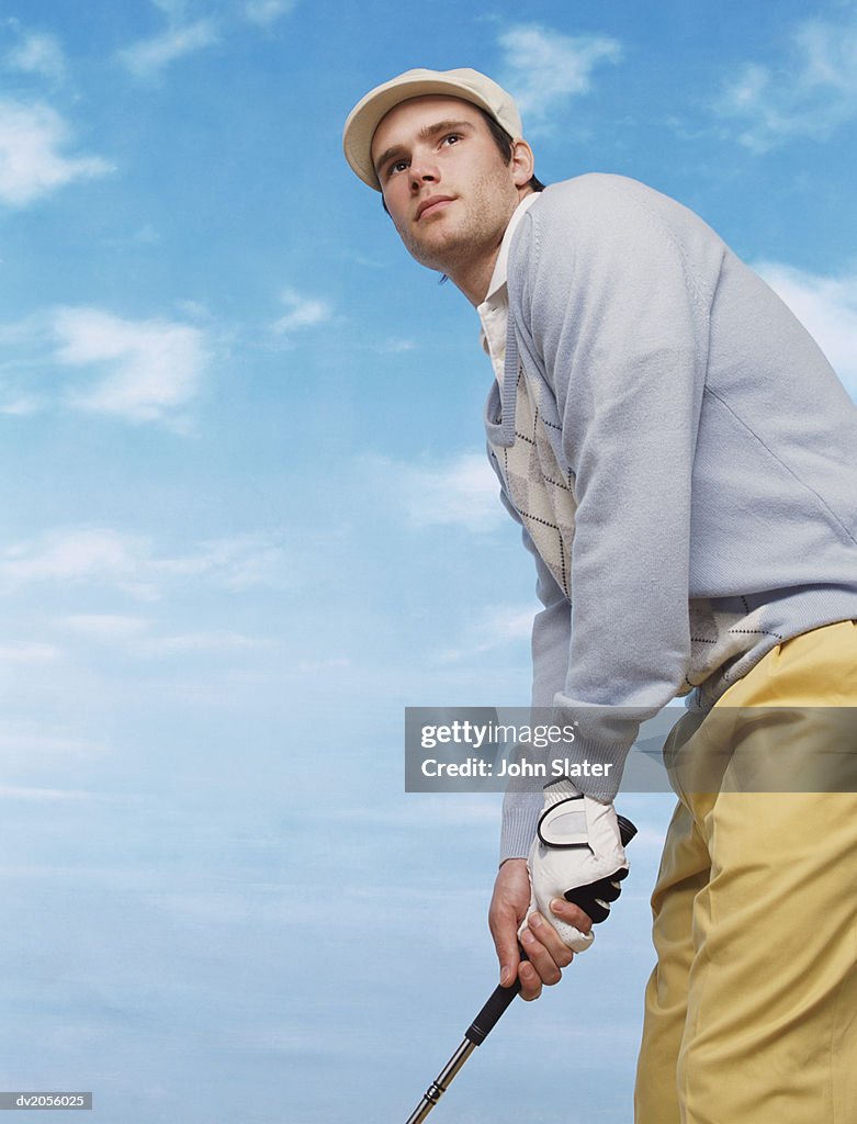Golfer Preparing to Take a Shot