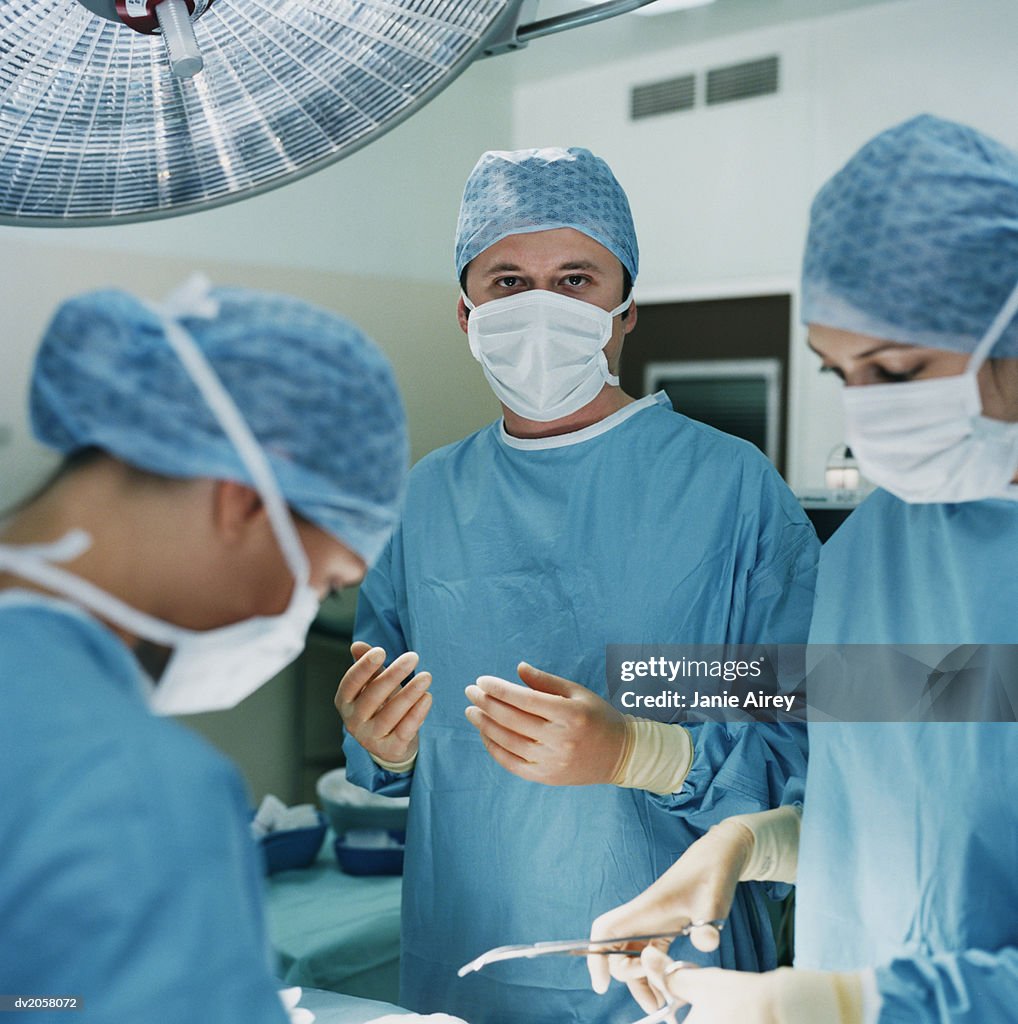 Three Surgeons at Work