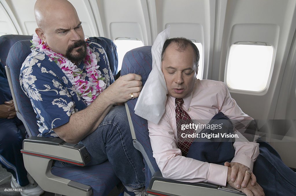 Passenger Getting Angry Over Seat Space on a Passenger Aeroplane