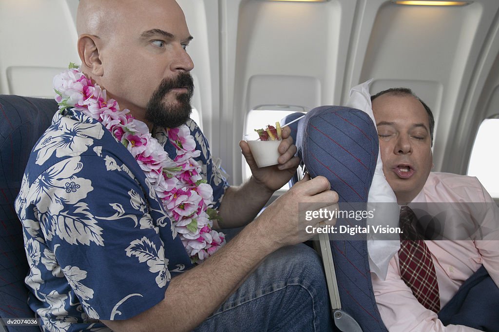 Passenger Getting Angry Over Seat Space on a Passenger Aeroplane