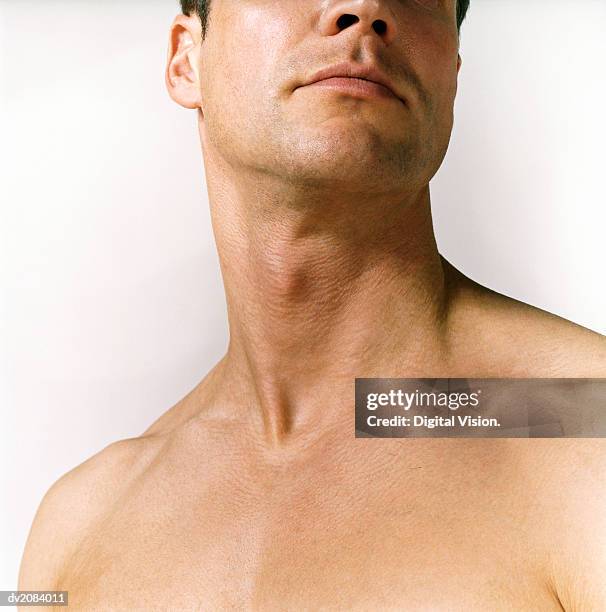 close up of a naked man's neck - menselijke nek stockfoto's en -beelden