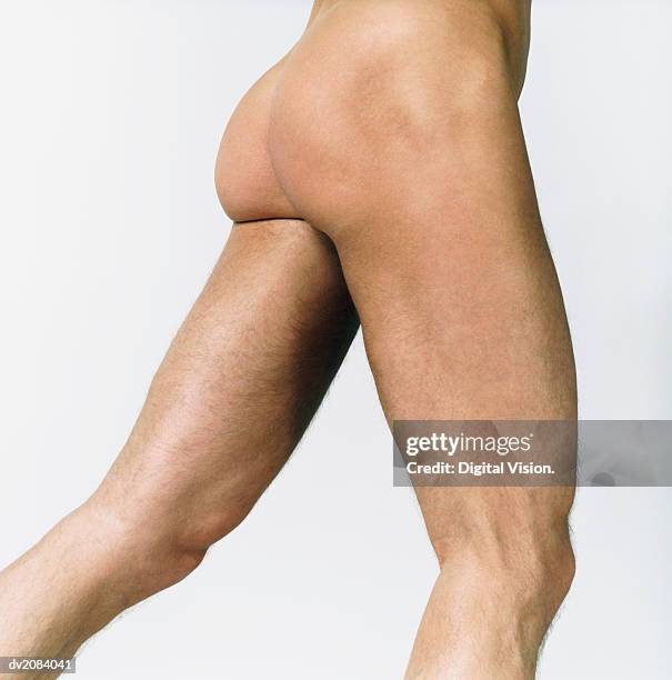 side view of a naked man's thighs - bare bottom stock pictures, royalty-free photos & images