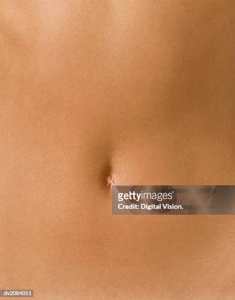 naked woman's stomach - belly button stock pictures, royalty-free photos & images