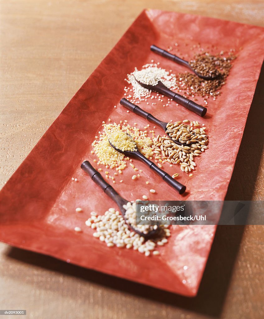 Dish With Spices and Wooden Spoons