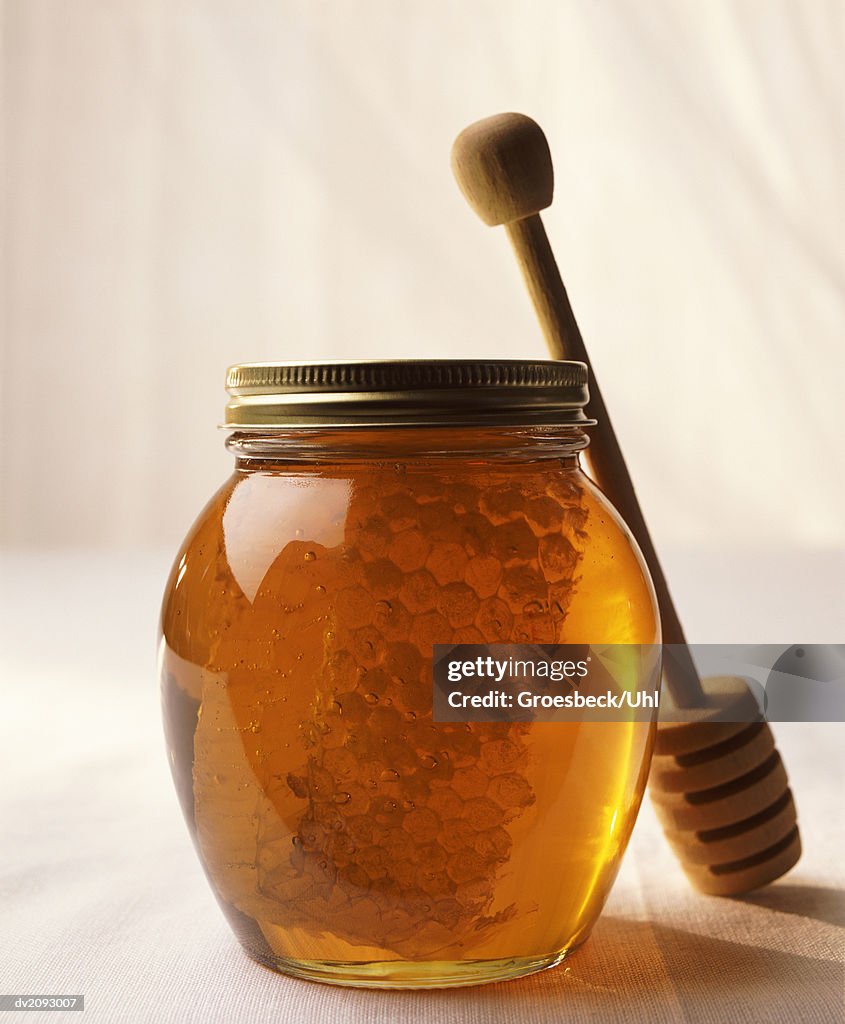 Still Life With a Jar of Honey and a Honey Drizzler