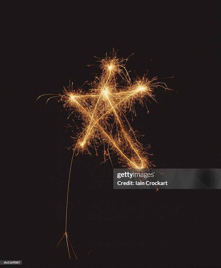 Star Shaped Firework High-Res Stock Photo - Getty Images
