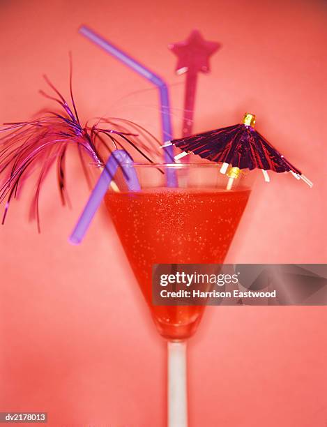 red cocktail - cocktail stick stock pictures, royalty-free photos & images