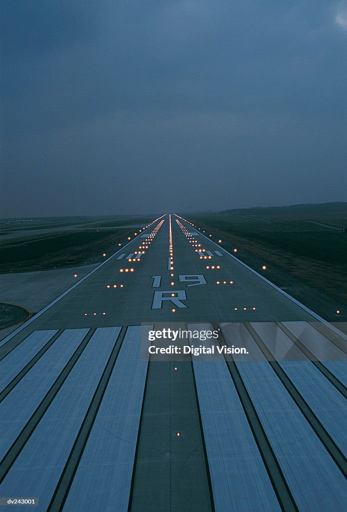 Lit flight runway at night