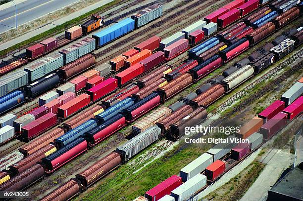 aerial view of box cars - boxcar stock pictures, royalty-free photos & images