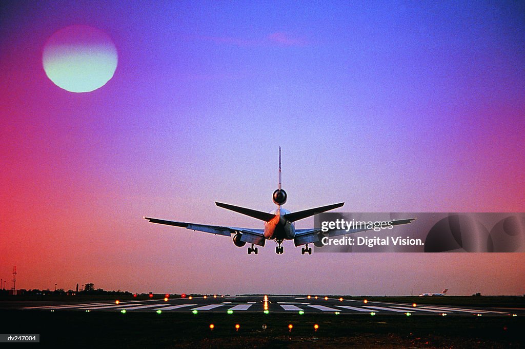 Plane landing on runway