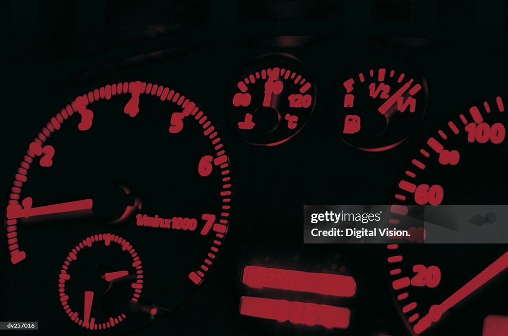 Close-up of luminous gauges and dials