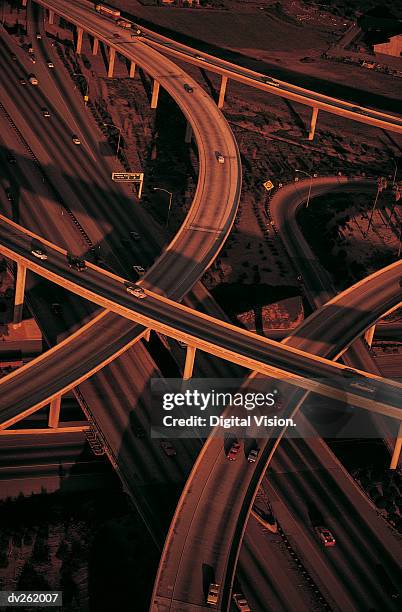 aerial shot of highway with lights - overhead road shot stock pictures, royalty-free photos & images