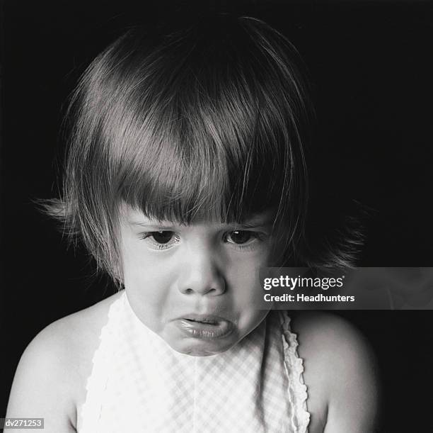 little girl crying - headhunters stock-fotos und bilder