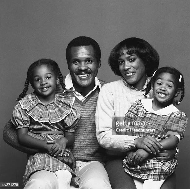 african american family of four - headhunters stock pictures, royalty-free photos & images