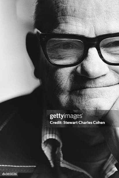 older man in glasses - stewart stock-fotos und bilder