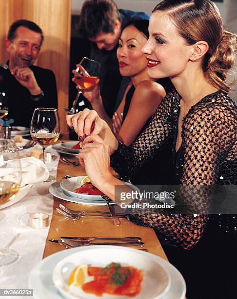 profile of smiling dinner guest - dinner guest stock pictures, royalty-free photos & images