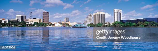 lake eola in orlando - orlando skyline stock pictures, royalty-free photos & images