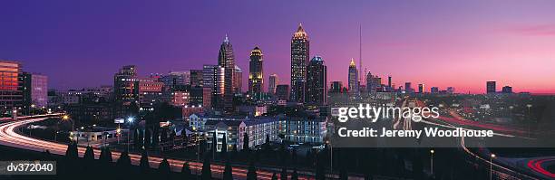 atlanta in evening - atlanta georgia tourist attractions stock pictures, royalty-free photos & images