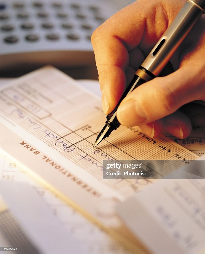 Man Write Check Person Writing Check High-Res Stock Photo - Getty Images