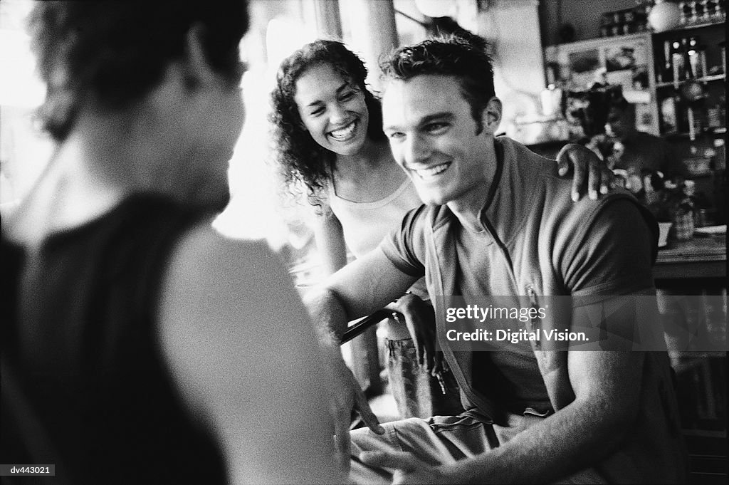 Three friends in a cafe