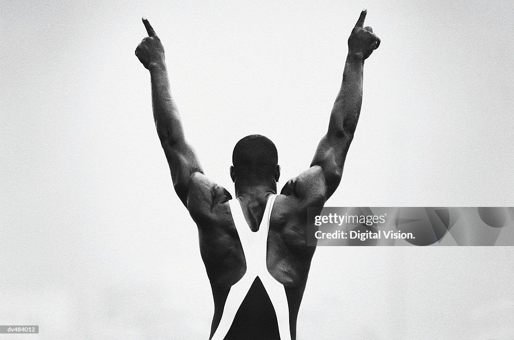 Runner giving victory sign