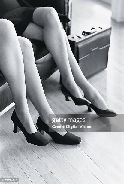 legs of businesswomen - lower employee engagement stock pictures, royalty-free photos & images