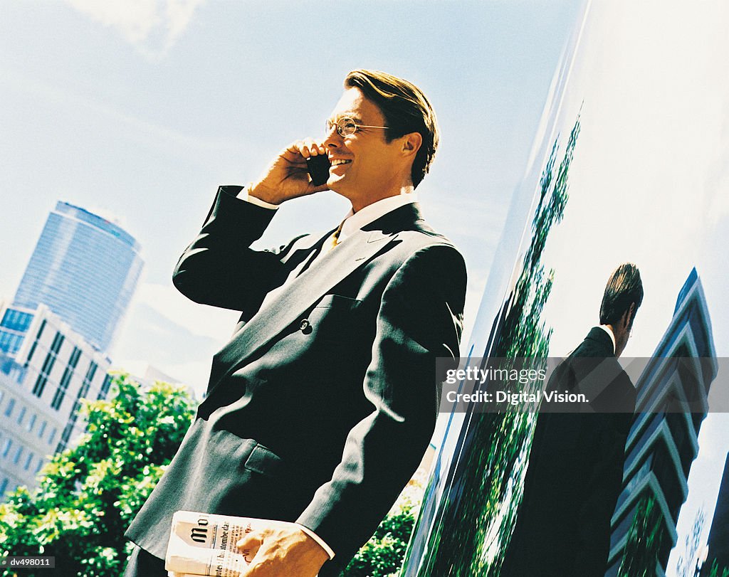 Businessman Using a Mobile Phone