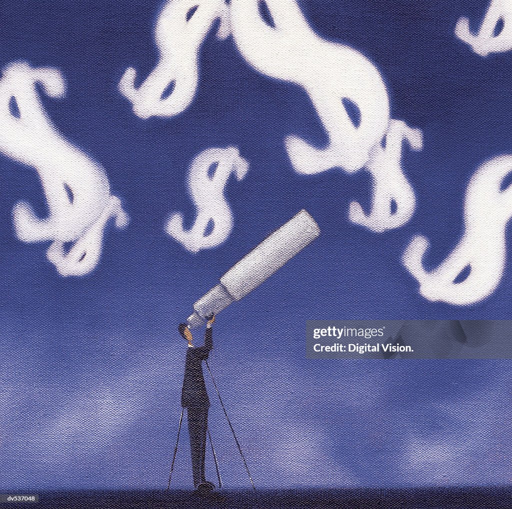 Businessman looking at dollar signs through a telescope