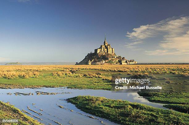 mont st michel, france - mont st michel stock pictures, royalty-free photos & images