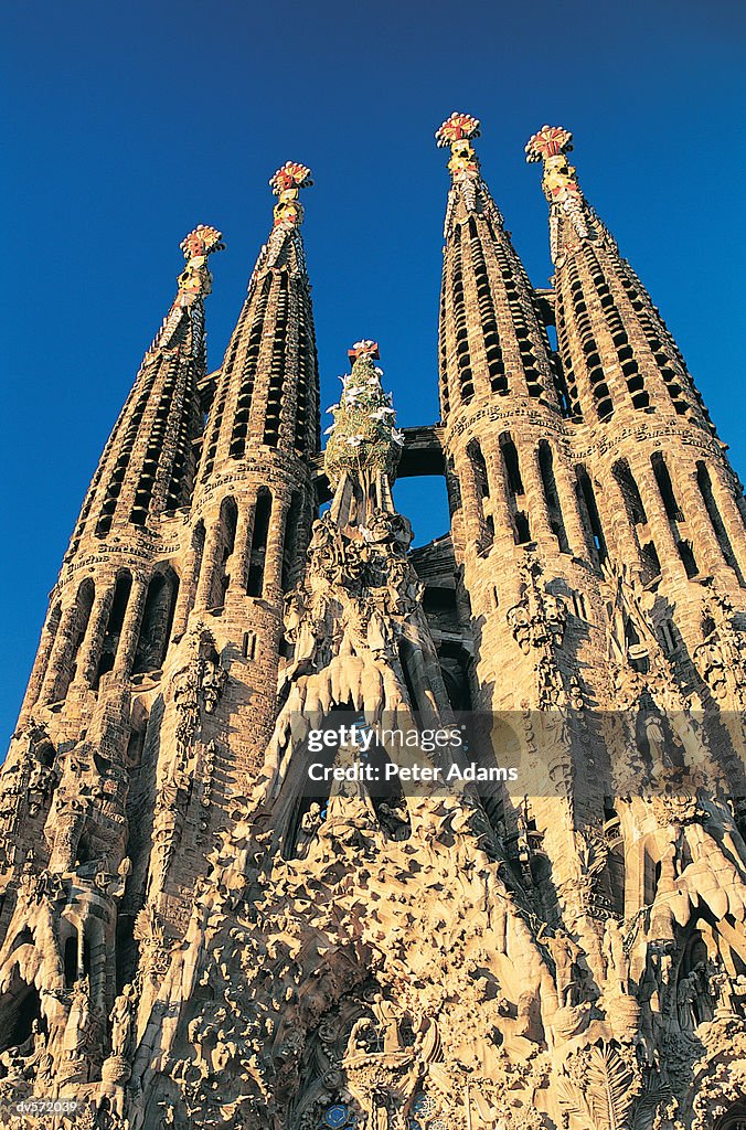 High Section and Close-up of the Sagraga Familia, Barcelona, Spain