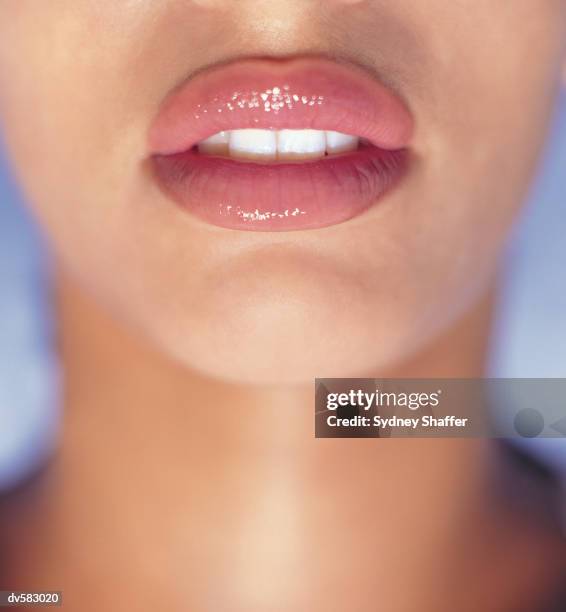 woman's mouth - lippen stock-fotos und bilder