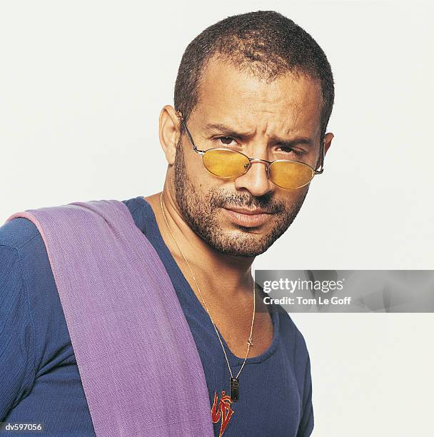 man wearing yellow tinted glasses - le ストックフォトと画像