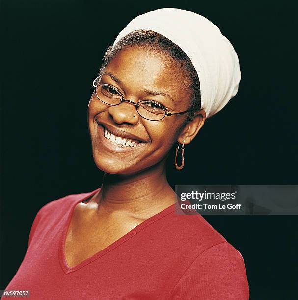 woman wearing headscarf and glasses - le ストックフォトと画像
